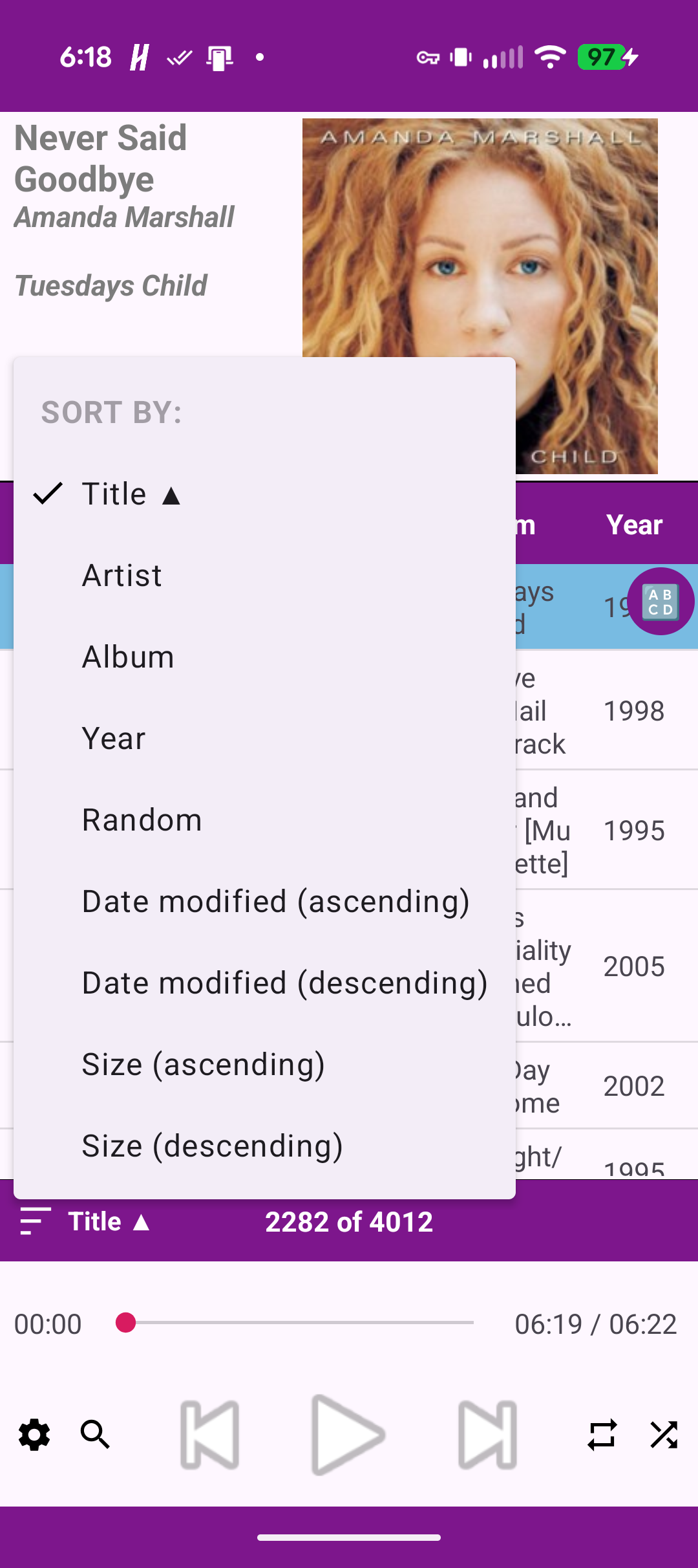 Sort menu with title, artist, album, and year options